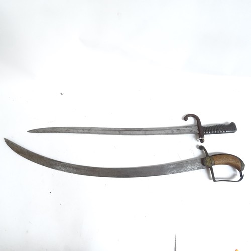 904 - A French 1871 pattern sword bayonet and scabbard, and a Middle Eastern tulwar sword and scabbard (2)