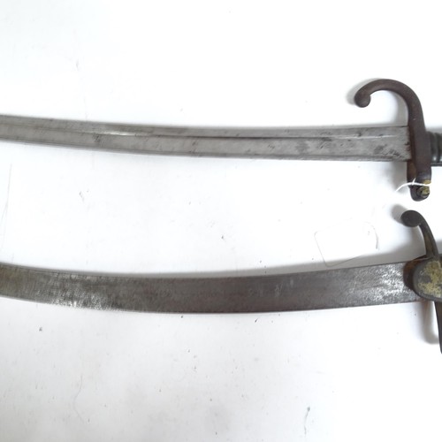 904 - A French 1871 pattern sword bayonet and scabbard, and a Middle Eastern tulwar sword and scabbard (2)