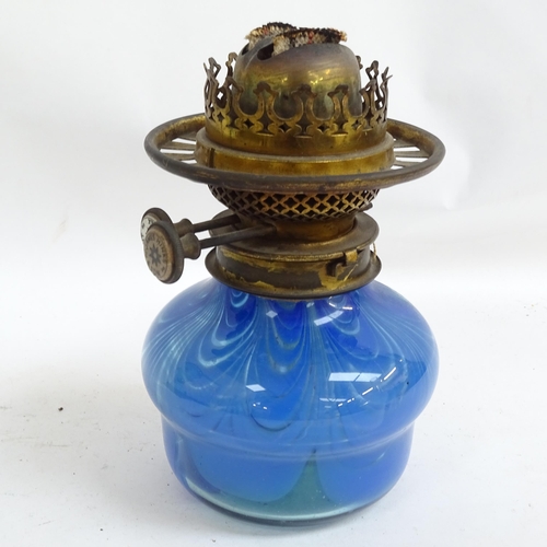 327 - An Antique brass oil lamp with cut-glass font, and another oil lamp with painted decoration, both wi... 