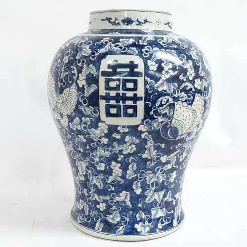 429 - A large Chinese blue and white porcelain baluster jar, with foliate decoration and butterflies, 4 ch... 