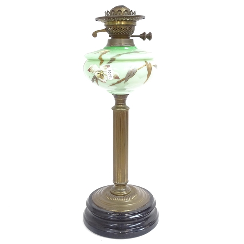 574 - A Victorian brass oil lamp, with painted glass font and etched shade, height 72cm, silver plated lam... 