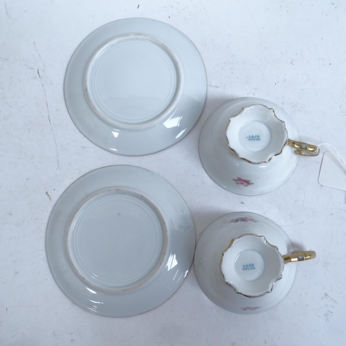 854 - An L & Co Nippon pattern part tea and cake service for 12 people