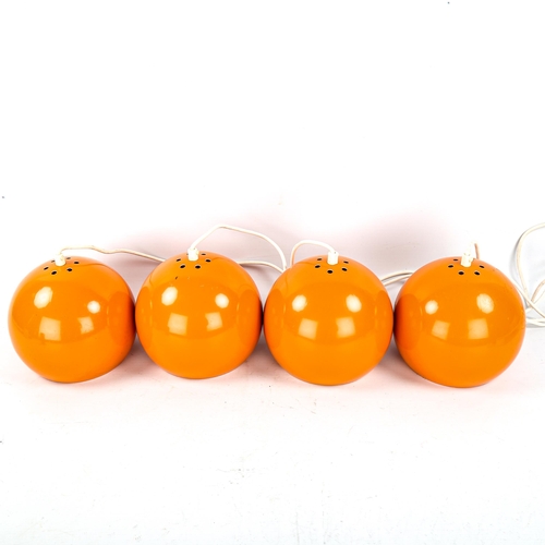 1568 - ES HORN AS., a set of 4 1960s Danish orange ball pendant lamps, with maker's labels