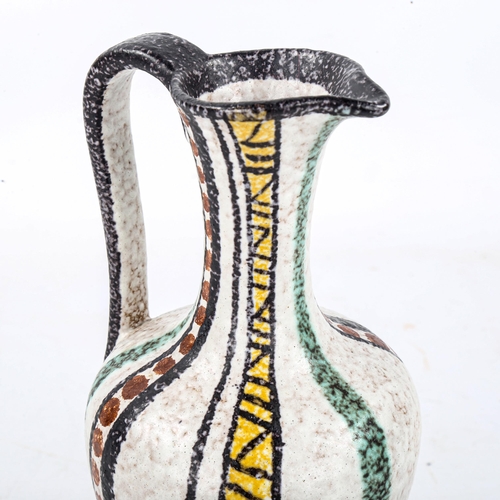 1571 - RUSCHA, Germany, a 1960s pottery jug with decorative striped design, height 20cm