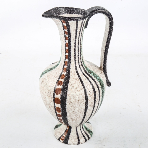 1571 - RUSCHA, Germany, a 1960s pottery jug with decorative striped design, height 20cm