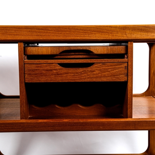 1599 - SALIN NYBORG, Denmark, a fine quality teak bar cart or trolley, with drop leaf to one side