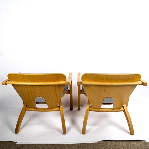 1617 - HANS WEGNER for Getama, Denmark, a pair of GE460 butterfly lounge chairs in oak, designed 1975, made... 