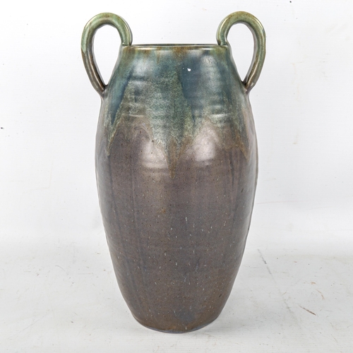 1623 - UPCHURCH POTTERY, a tall twin-handled vase, height 33cm