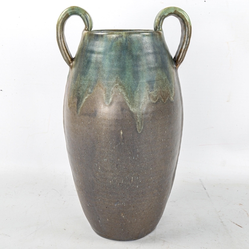 1623 - UPCHURCH POTTERY, a tall twin-handled vase, height 33cm