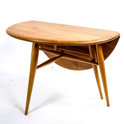 1631 - An ERCOL Windsor drop leaf coffee table in elm and beech, height 40cm