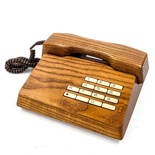 1639 - GFELLER TRUB, A 1970s'/80s' solid elm telephone.