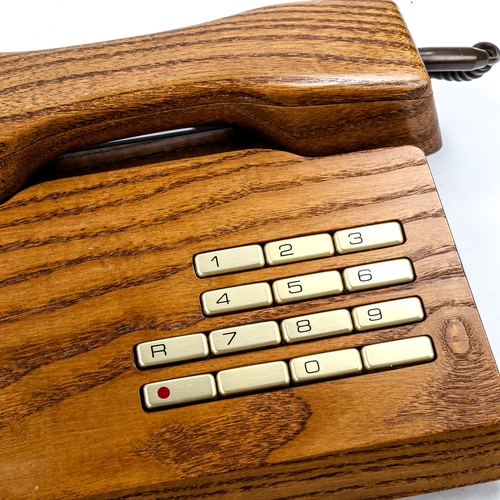 1639 - GFELLER TRUB, A 1970s'/80s' solid elm telephone.