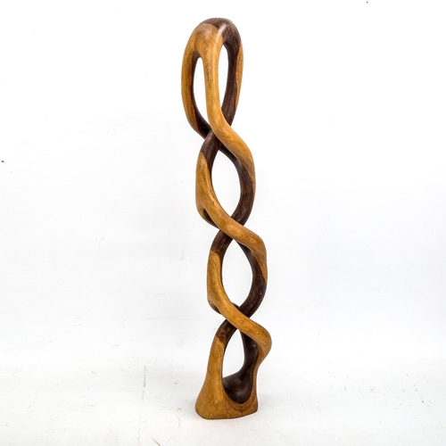 1642 - A mid-century lattice hardwood sculpture, carved signature to base, height 50cm