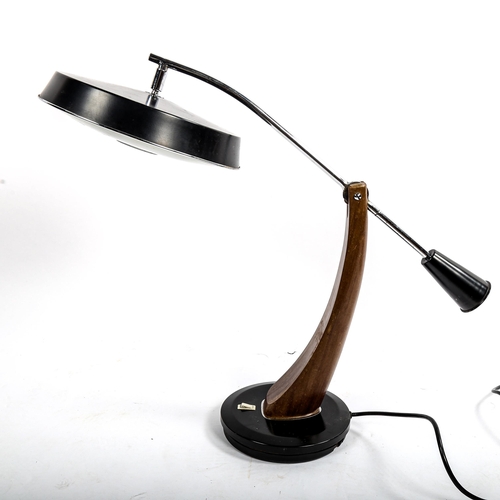 1647 - FASE, Spain, a 1950s' designed Presidente  desk lamp, with swivel base and adjustable arm, moulded m... 