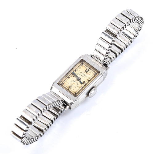 24 - ROLEX - a lady's Art Deco stainless steel mechanical bracelet watch, ref. 2627, circa 1940s, silvere... 