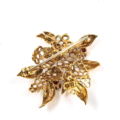 101 - A late 20th century 18ct gold garnet and diamond honeycomb brooch, openwork leaf settings with round... 