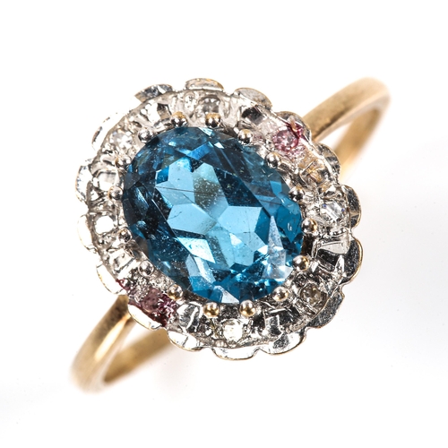 106 - A modern blue topaz and diamond cluster ring, unmarked gold settings with oval mixed-cut topaz and s... 