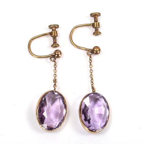 107 - A pair of amethyst drop earrings, gilt-metal settings with oval mixed-cut amethysts, amethysts measu... 