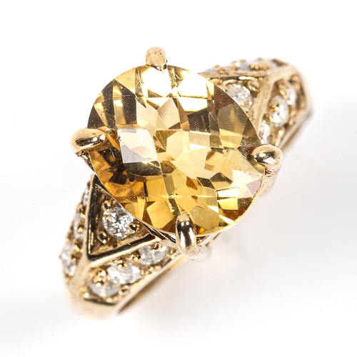 109 - A modern 9ct gold citrine and diamond dress ring, set with oval rose-cut citrine and modern round br... 