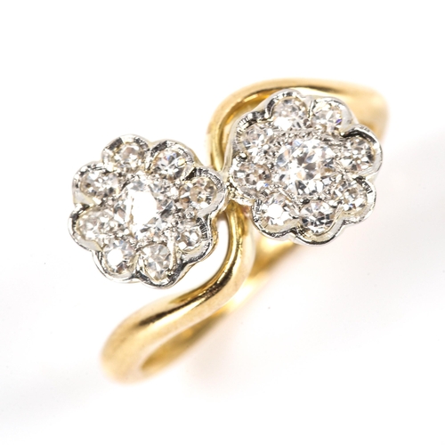 114 - An 18ct gold diamond double flowerhead crossover ring, set with old European and single-cut diamonds... 