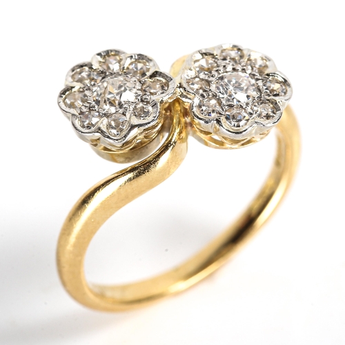 114 - An 18ct gold diamond double flowerhead crossover ring, set with old European and single-cut diamonds... 