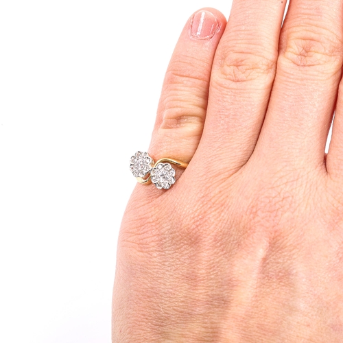 114 - An 18ct gold diamond double flowerhead crossover ring, set with old European and single-cut diamonds... 