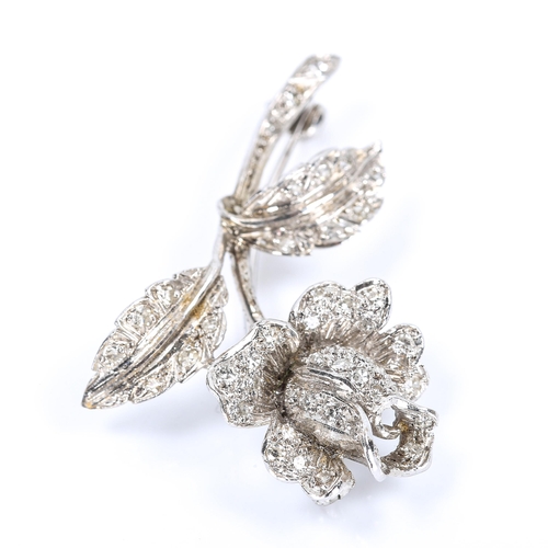 117 - A late 20th century 18ct white gold diamond rose brooch, pave set with single-cut diamonds, brooch l... 