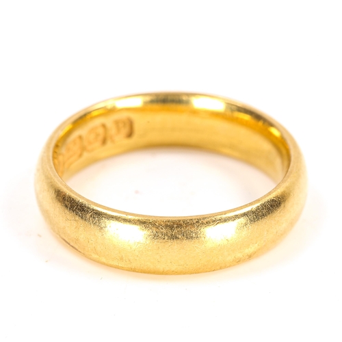 118 - A 22ct gold wedding band ring, maker's marks SH, hallmarks Birmingham 1914, band width 4.8mm, size L... 