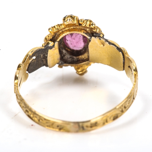 122 - A Victorian ruby and emerald cluster dress ring, pierced foliate shoulders with engraved shank, 12mm... 