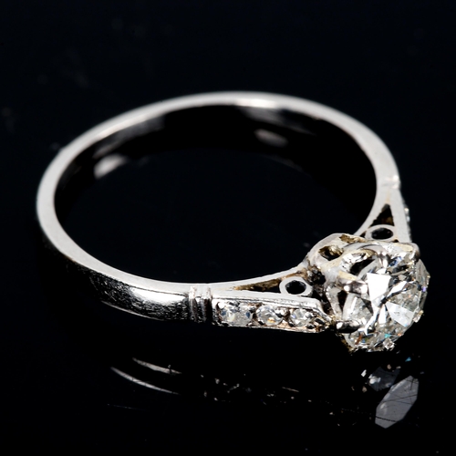 124 - An Antique platinum 0.6ct solitaire diamond ring, claw set with round brilliant diamond and single-c... 