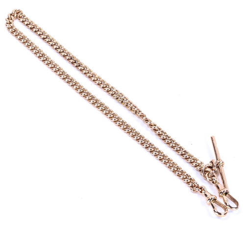 125 - An early 20th century 9ct rose gold Albert chain necklace, curb links with sliding T-bar and 2 dog c... 