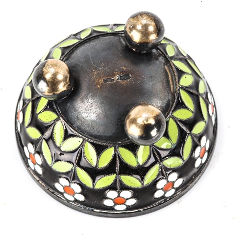 135 - A Russian silver and champleve enamel salt cellar, daisy flower decoration on 3 bun feet, marks on b... 