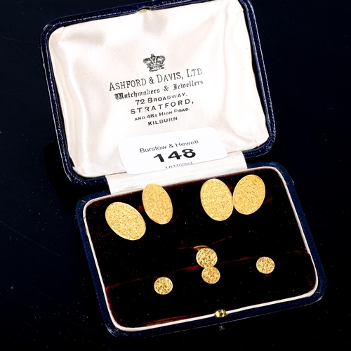 148 - An early 20th century 9ct gold dress set, comprising pair of cufflinks, and 4 dress studs, engraved ... 