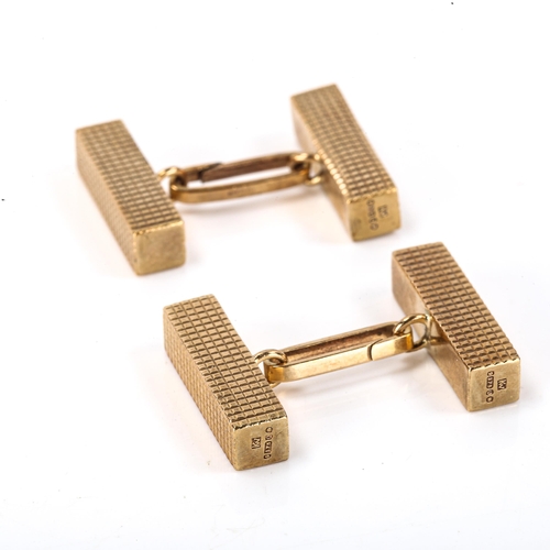 155 - A pair of mid-20th century 9ct gold cuboid cufflinks, engraved decoration, maker's marks KW, hallmar... 