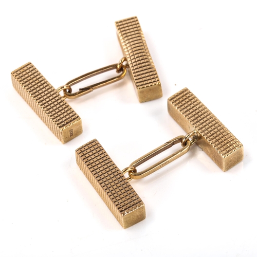 155 - A pair of mid-20th century 9ct gold cuboid cufflinks, engraved decoration, maker's marks KW, hallmar... 