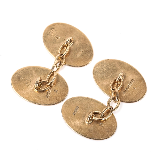 162 - A pair of early 20th century 9ct gold oval cufflinks, engine turned decoration, maker's marks LAP, h... 