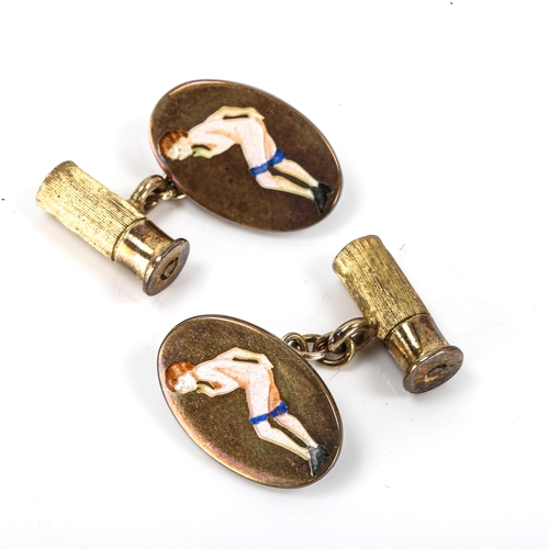 164 - A pair of late 20th century silver-gilt gentleman's novelty cufflinks, with enamel nude lady and sho... 