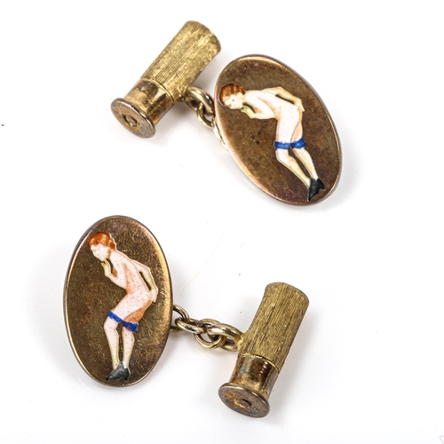 164 - A pair of late 20th century silver-gilt gentleman's novelty cufflinks, with enamel nude lady and sho... 