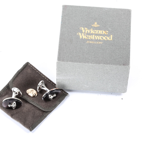 167 - VIVIENNE WESTWOOD - a pair of modern black mother-of-pearl Orb cufflinks, chrome plated settings, pa... 