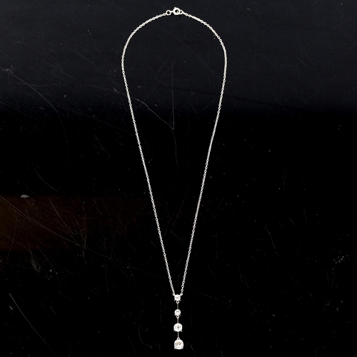 69 - A fine Art Deco diamond line pendant necklace, unmarked white metal settings with graduated old-cut ... 