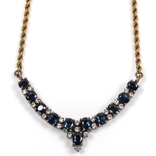 72 - A 9ct gold and silver blue and white sapphire necklace, on rope twist chain, necklace length 42cm, 1... 