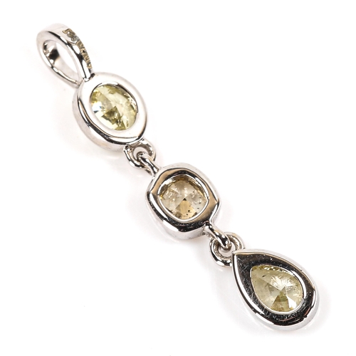 88 - A modern 18ct white gold fancy yellow diamond line pendant, bezel set with vari-cut diamonds, total ... 