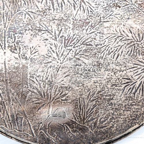 96 - A Chinese export silver tray, by Wang Hing circa 1900, circular form with engraved bamboo decoration... 