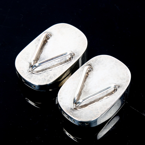 98 - A pair of Japanese novelty export silver geta (muji) pepperettes, hand planished decoration, length ... 