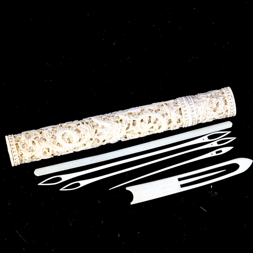 1025 - A 19th century Chinese ivory cylindrical needle case, with relief carved dragon and exotic bird deco... 