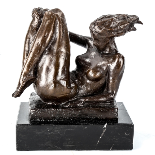 1032 - A patinated bronze sculpture, modernist female nude, unsigned on marble base, height 21cm, base leng... 