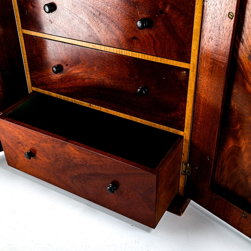 1045 - A Victorian mahogany table cabinet, with 2 panelled doors enclosing 4-drawer interior, width 38cm, h... 