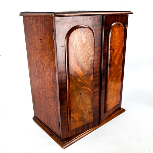 1045 - A Victorian mahogany table cabinet, with 2 panelled doors enclosing 4-drawer interior, width 38cm, h... 