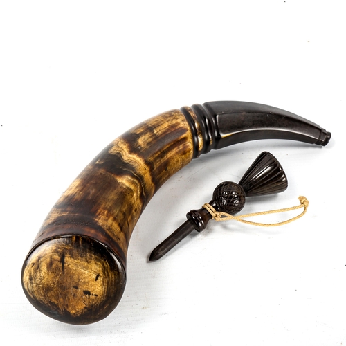 1069 - A large Victorian Scottish buffalo horn powder flask with carved thistle end, length 38cm