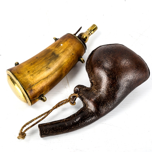 1070 - An Antique buffalo horn powder flask with brass mounts, length 18cm, and a pressed stitched leather ... 